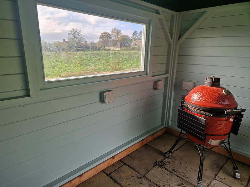  Fitting plugs in a summerhouse in Wareham Dorset